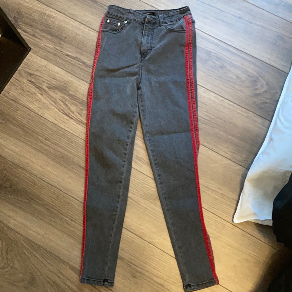 black skinny jeans with red racing stripes